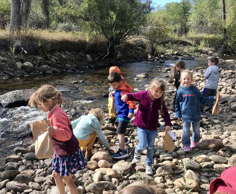 Students by creek