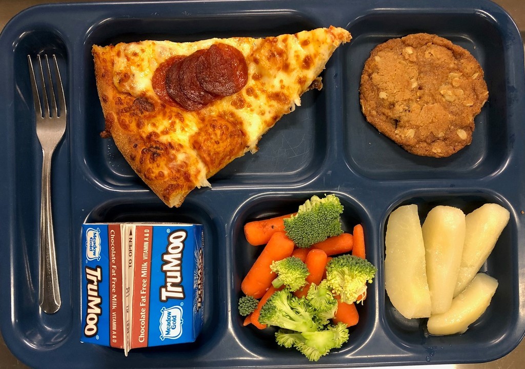 Lunch Tray with pizza, veggies, fruit, milk